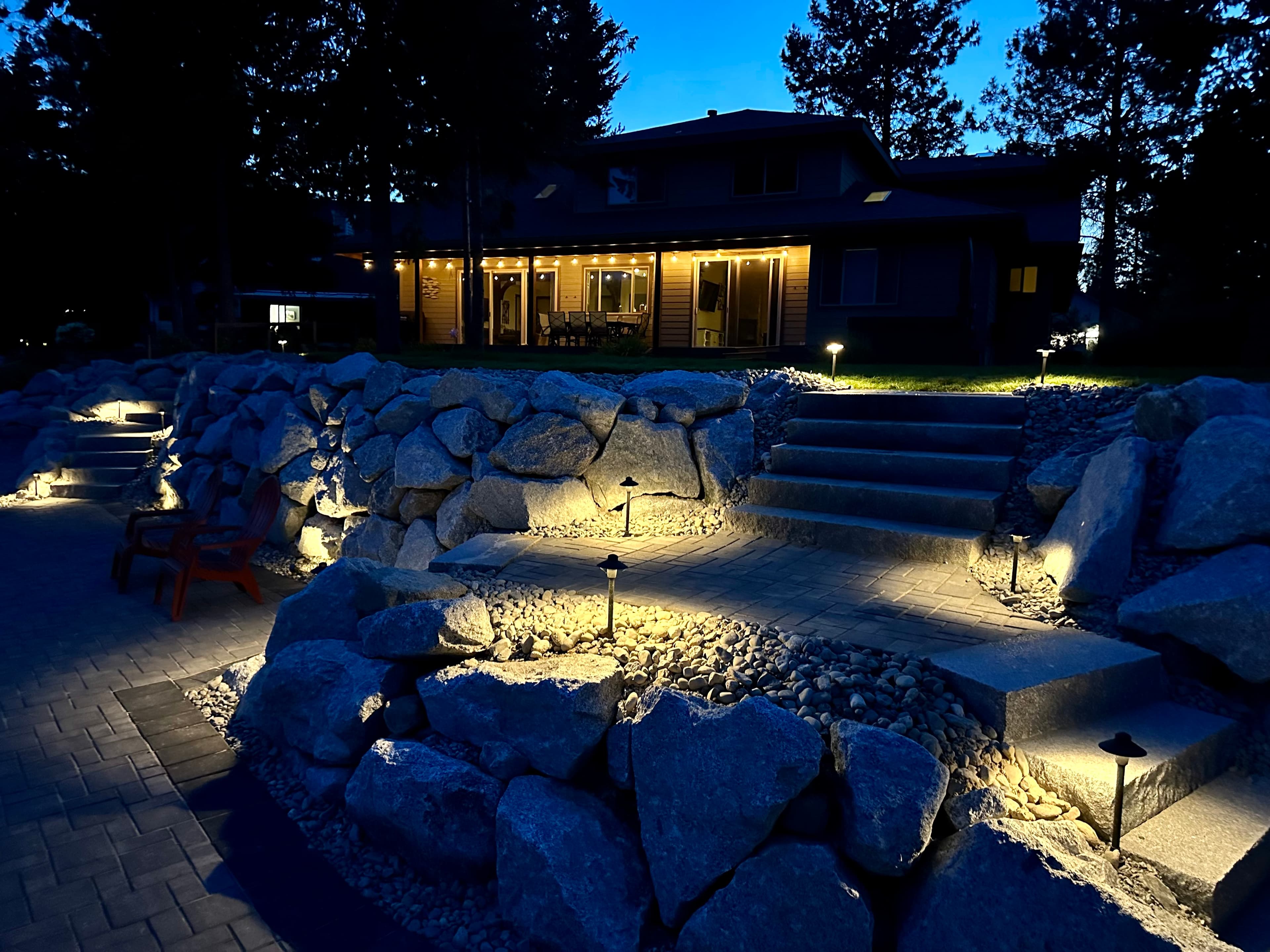 Landscape lighting on patio and stone steps